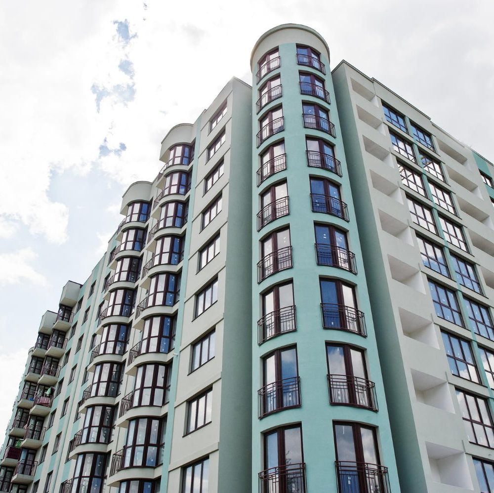 balcony-new-modern-turquoise-multi-storey-residential-building-house-residential-area-sunny-blue-sky